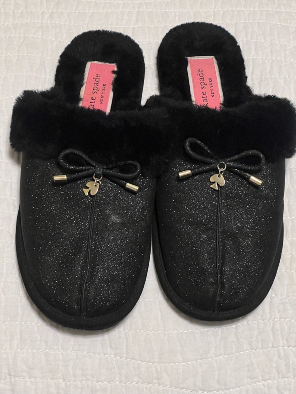 kate spade black fuzzy slipper with pink label